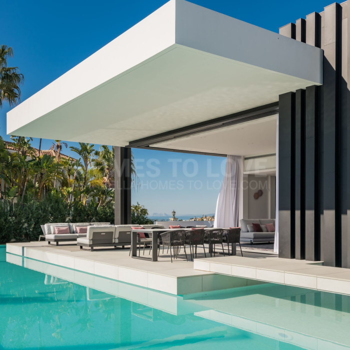 Elegant Villa Nebbia with Avant-Garde Design and Golf Frontage for Sale in Benahavis