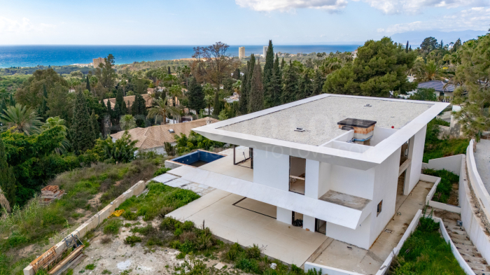 Vivez un luxe inégalé avec cette villa clé en main bientôt achevée dans la prestigieuse Hacienda Las Chapas